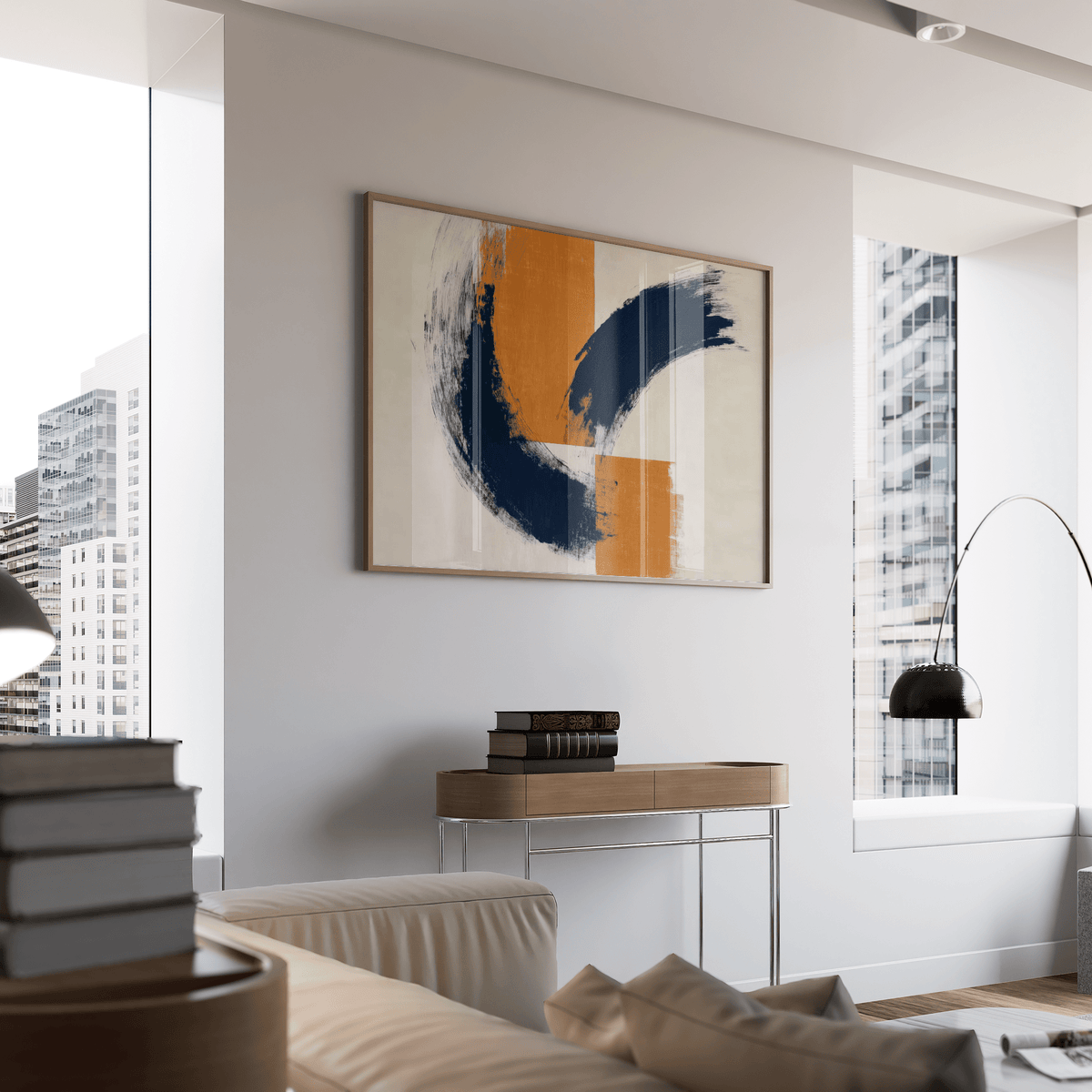 Framed blue orange wall poster with abstract brush strokes above a wooden console table