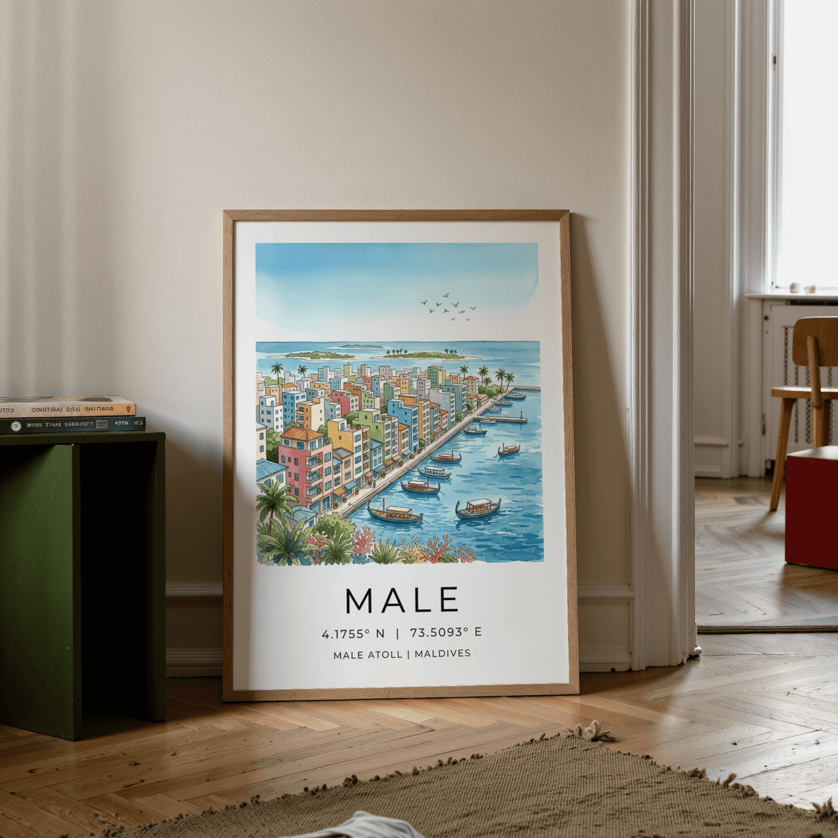 Print leaning on floor of Maldives City Art Print showing colourful coastal town with boats next to a green side table