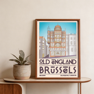 Framed Brussels Architecture print showing an old England building in pastel colours near a green plant