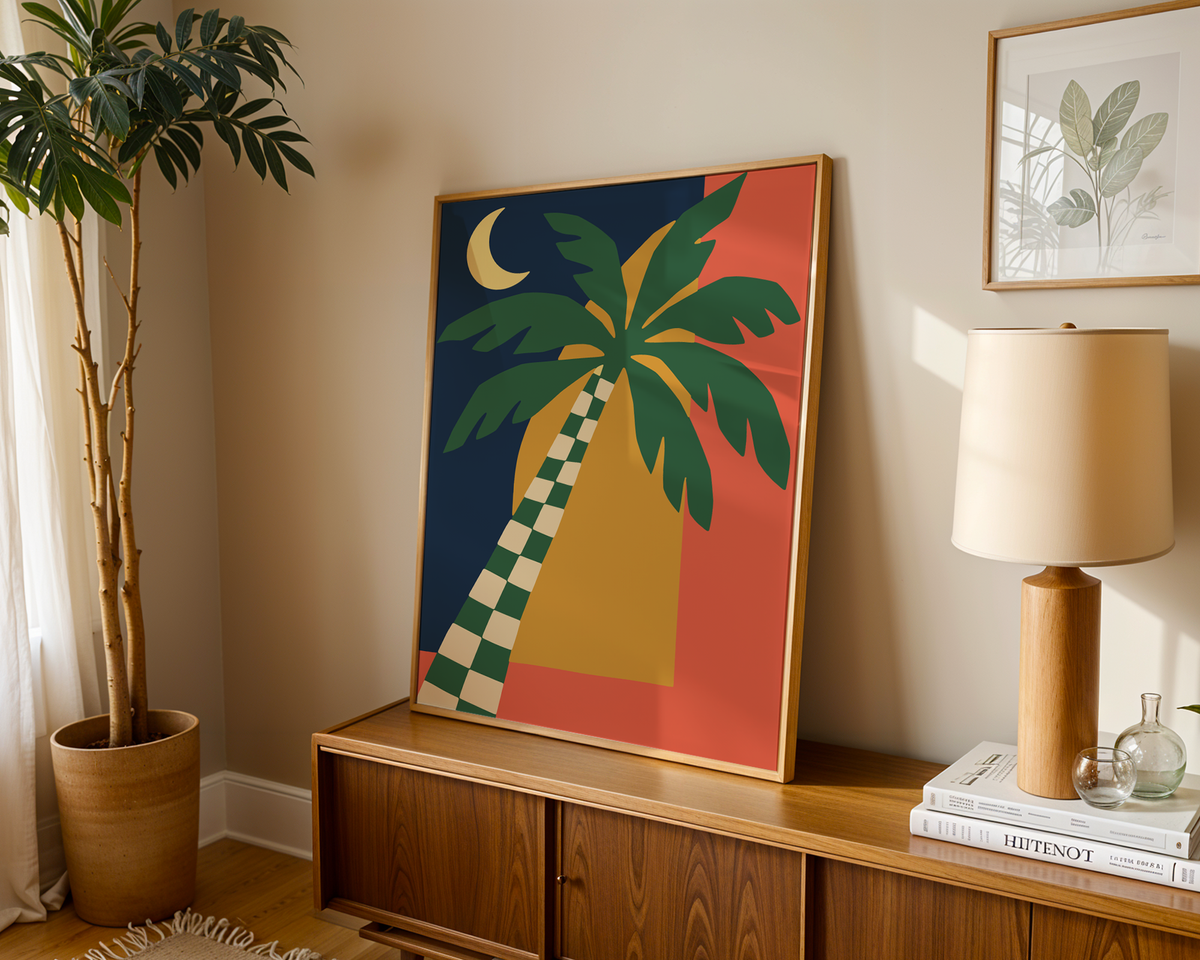 Palm tree print with a checked trunk leaning on a wooden sideboard in a warm living room
