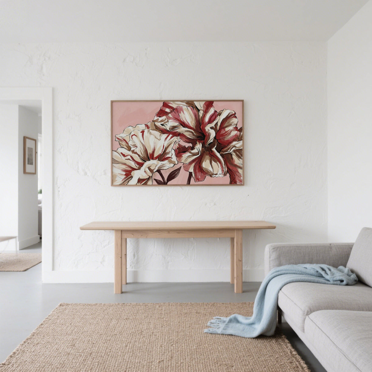 Pink Background Flower Print with striped watercolour flowers above a wooden bench in a modern living room