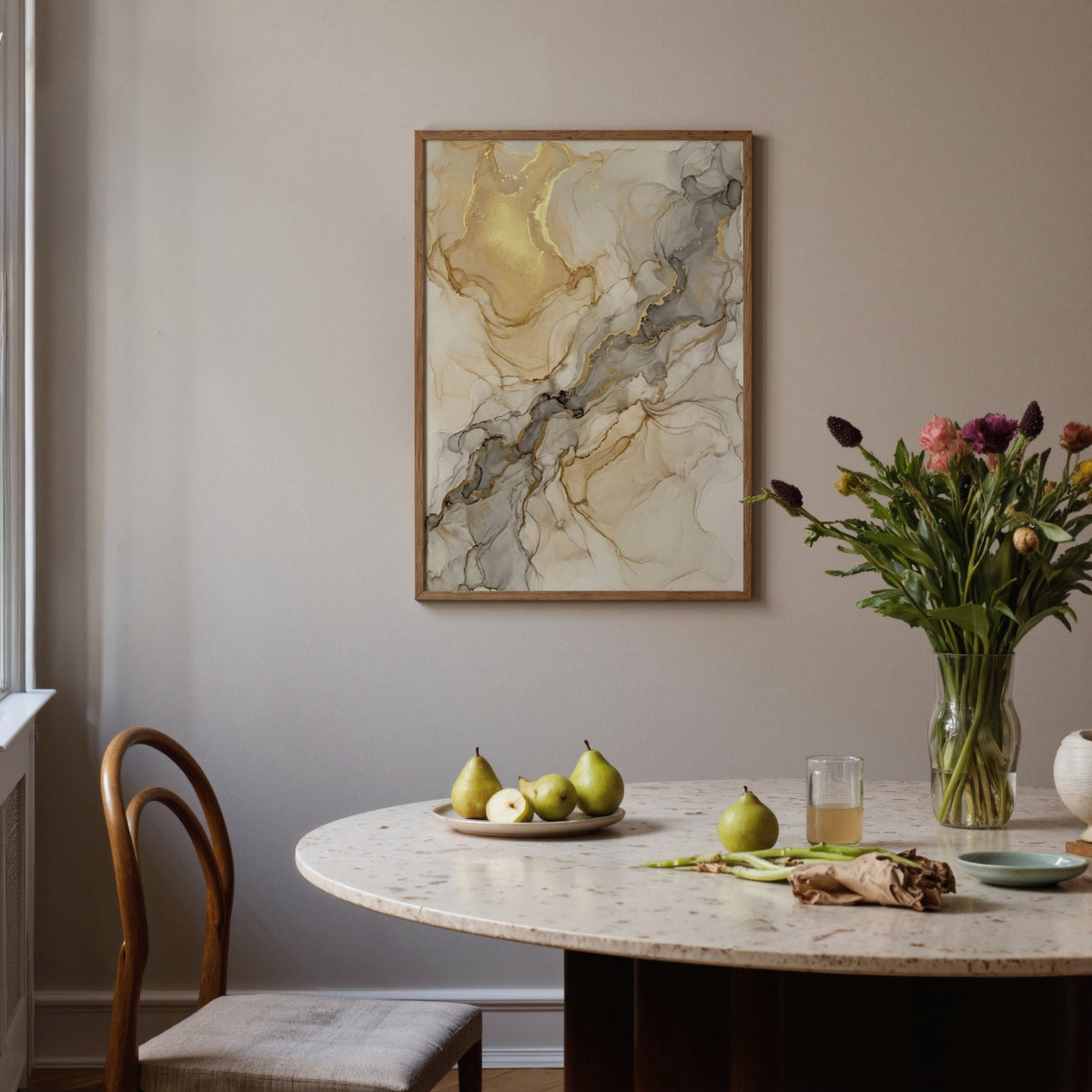 Beige Abstract Print hanging above a dining table with pears and flowers in a vase