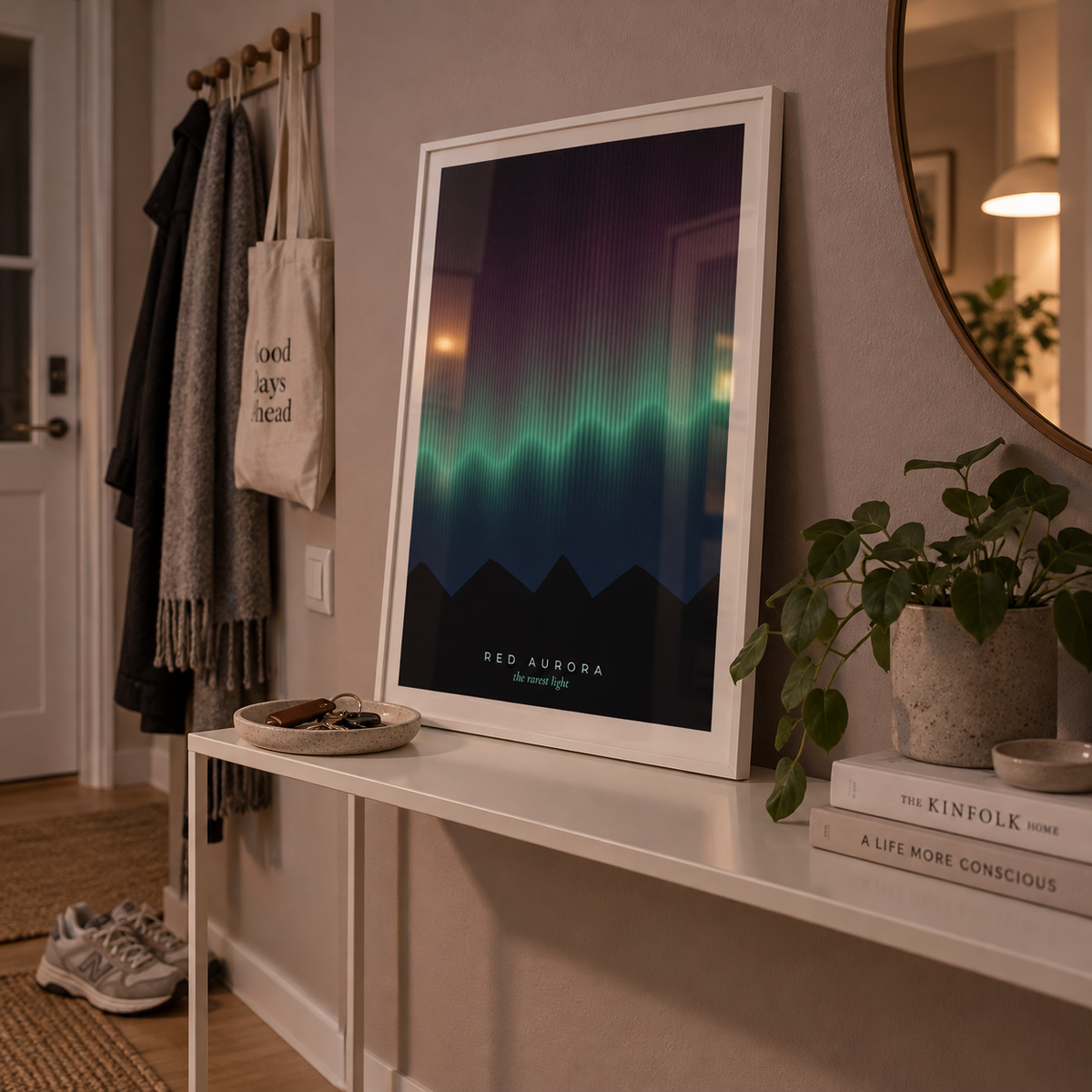 Red and green aurora print above a console in a hallway