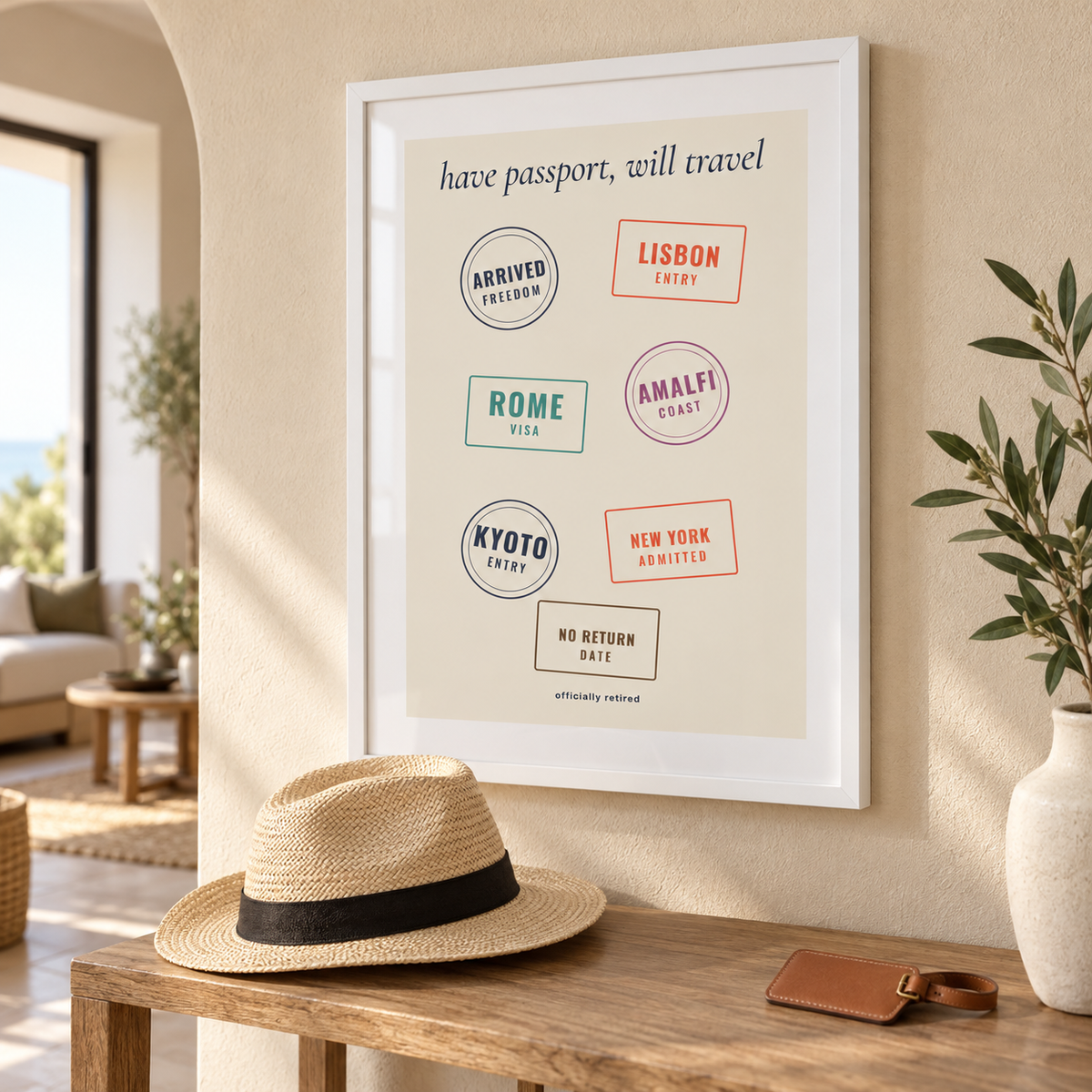 Passport stamps retirement print above a console table in a hallway