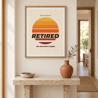 Retro sunset retired print above a console table in a hallway