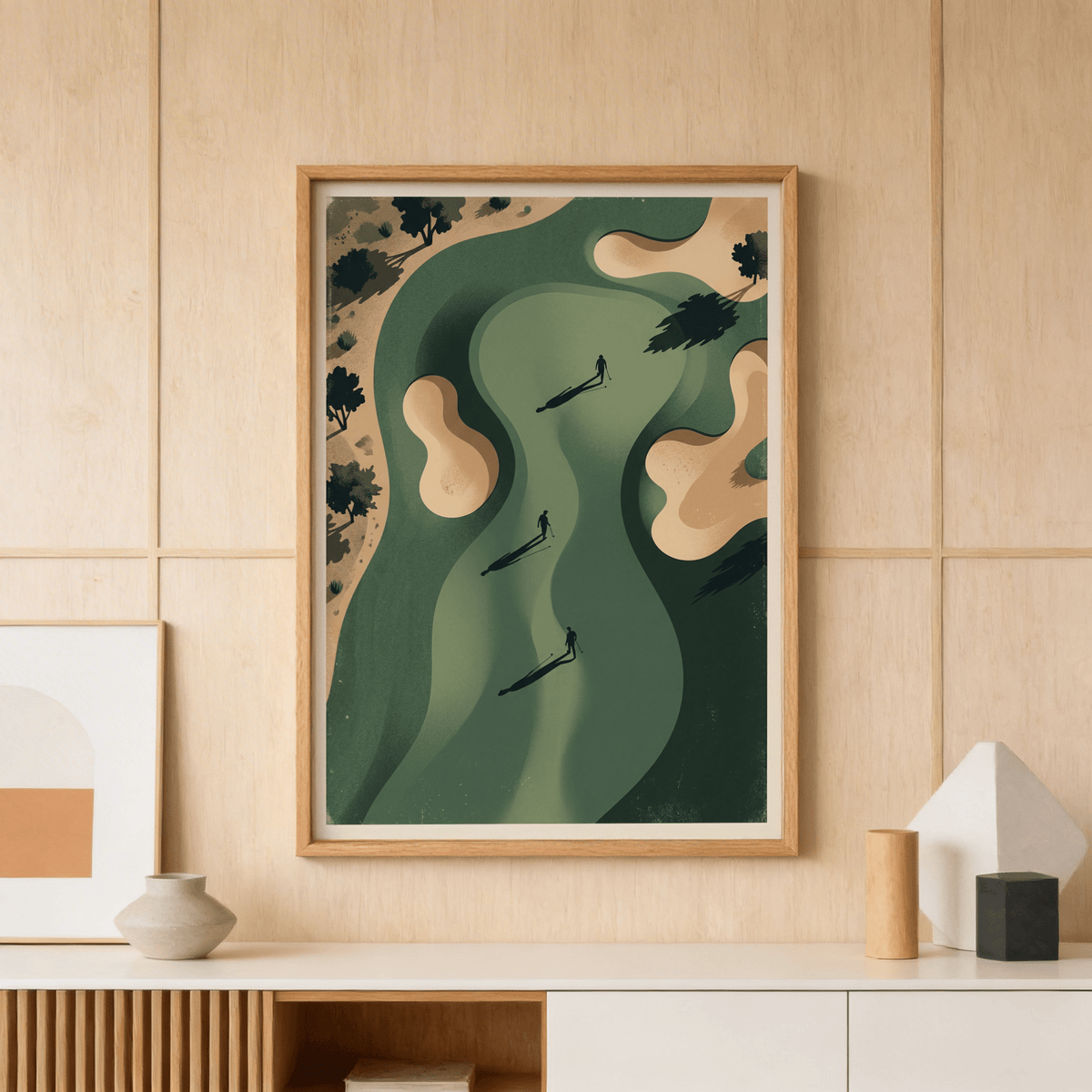 Golf silhouette wall art of a minimalist golf course with players and shadows above a wooden sideboard