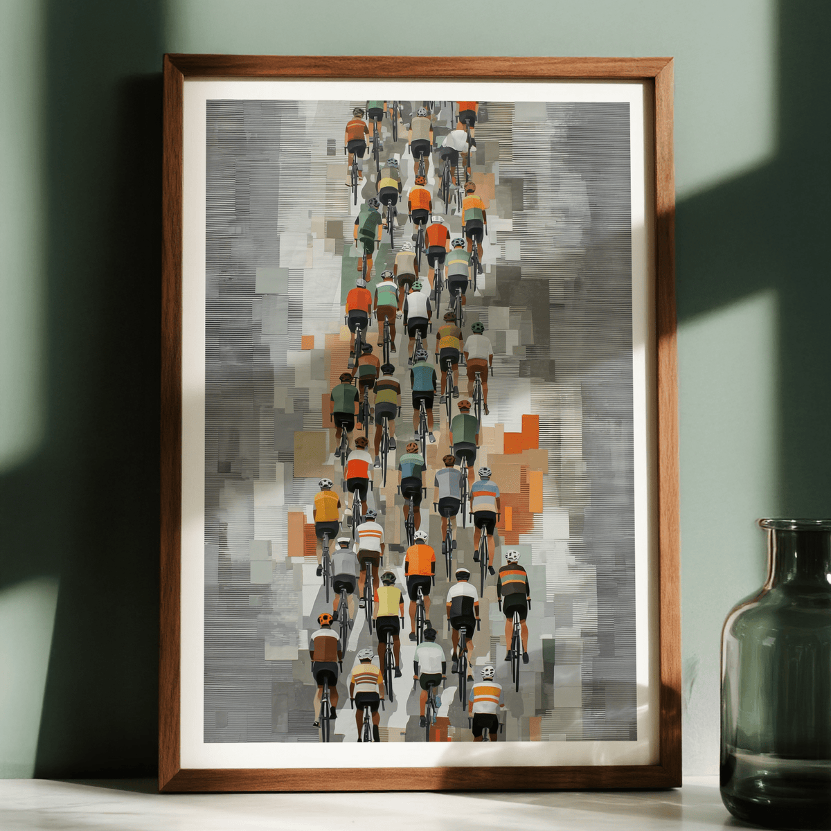 Framed Bicycle Racing Poster with a group of cyclists in muted grey and orange tones leaning on a surface next to a green vase