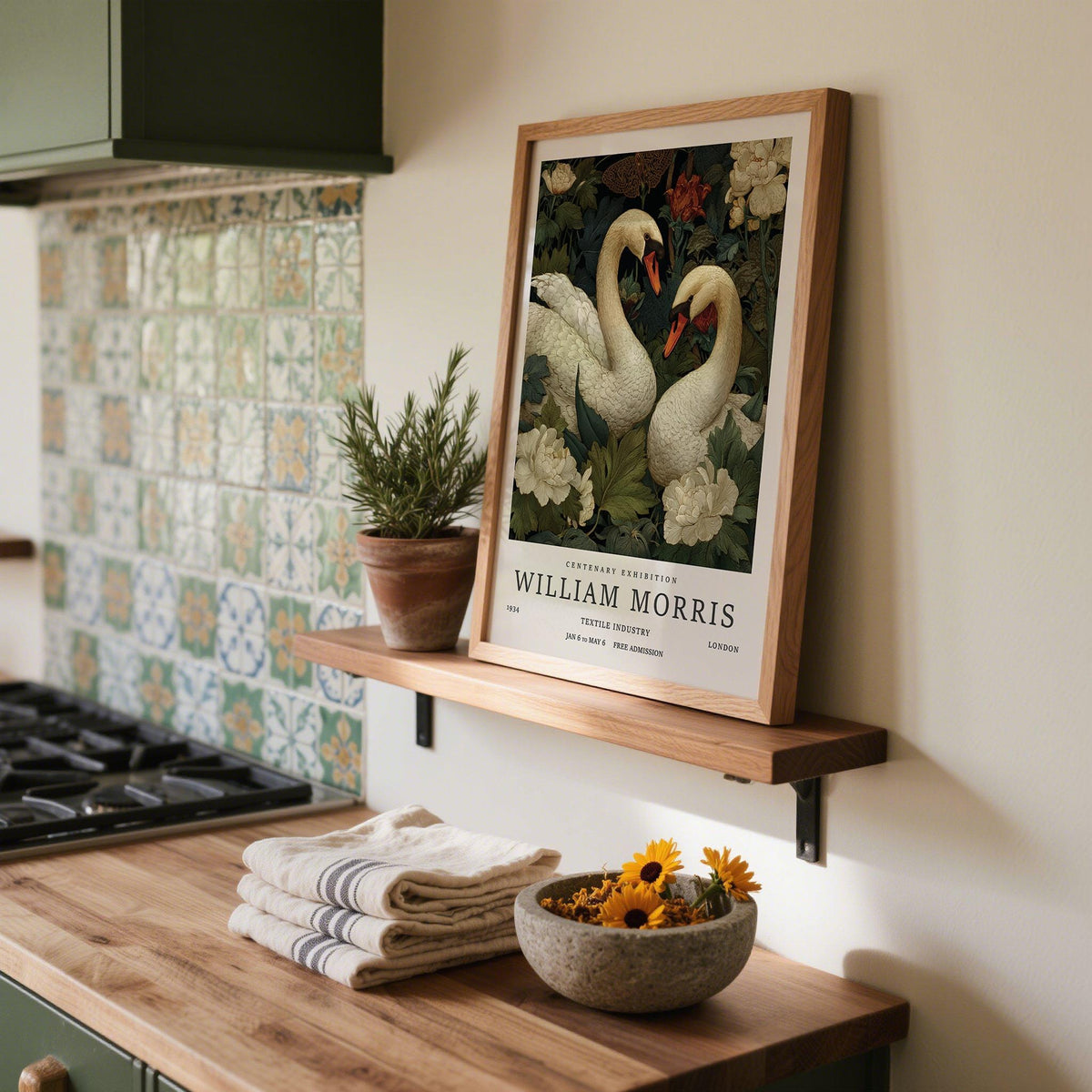 Print leaning on a shelf of swan wall art with botanical illustration style in a kitchen