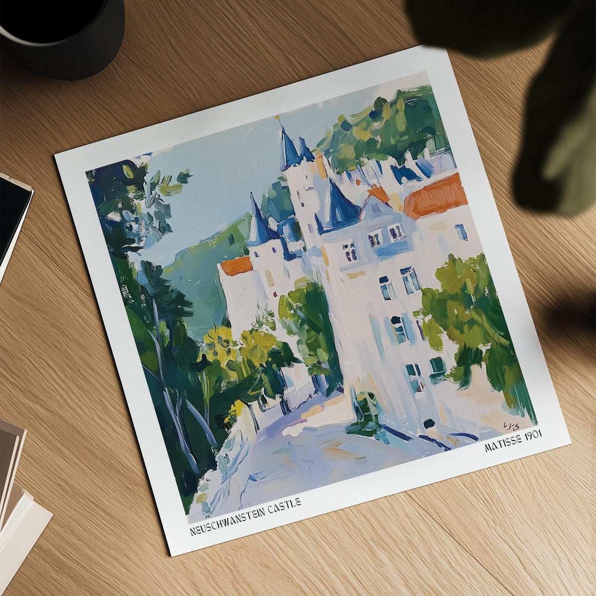 Medieval Castle Art print of a watercolour-style castle scene on a wooden table with a plant shadow