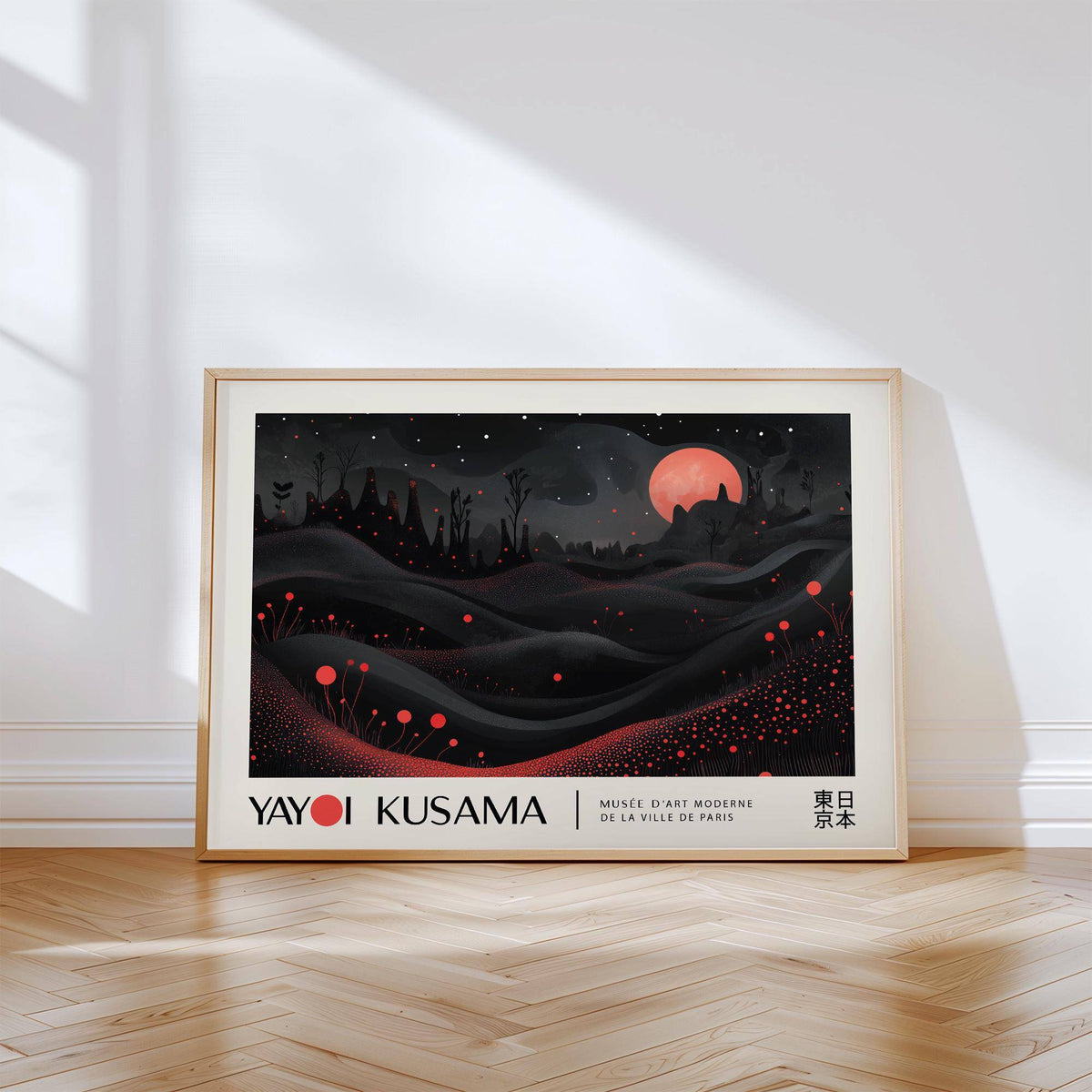 Moon print leaning on a wooden floor showing an abstract surreal red moon landscape with dark hills