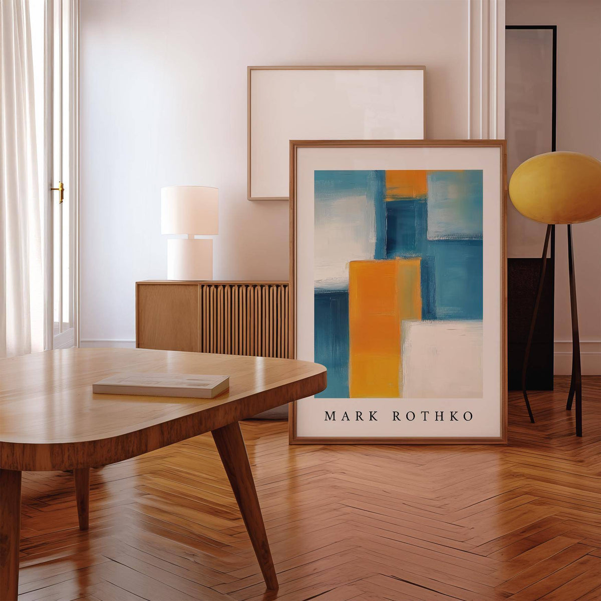 Blue and Yellow Wall Art print leaning on a wooden floor beside a yellow lamp