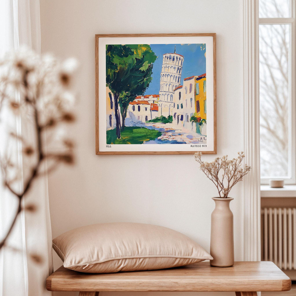 Leaning Tower of Pisa Pictures featuring an illustrated tower with green trees above a beige cushion and vase