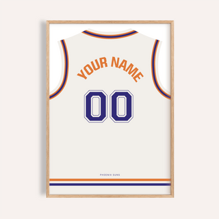 Framed Basketball Jersey Poster in White with Purple Number with orange and navy details on a pale wall