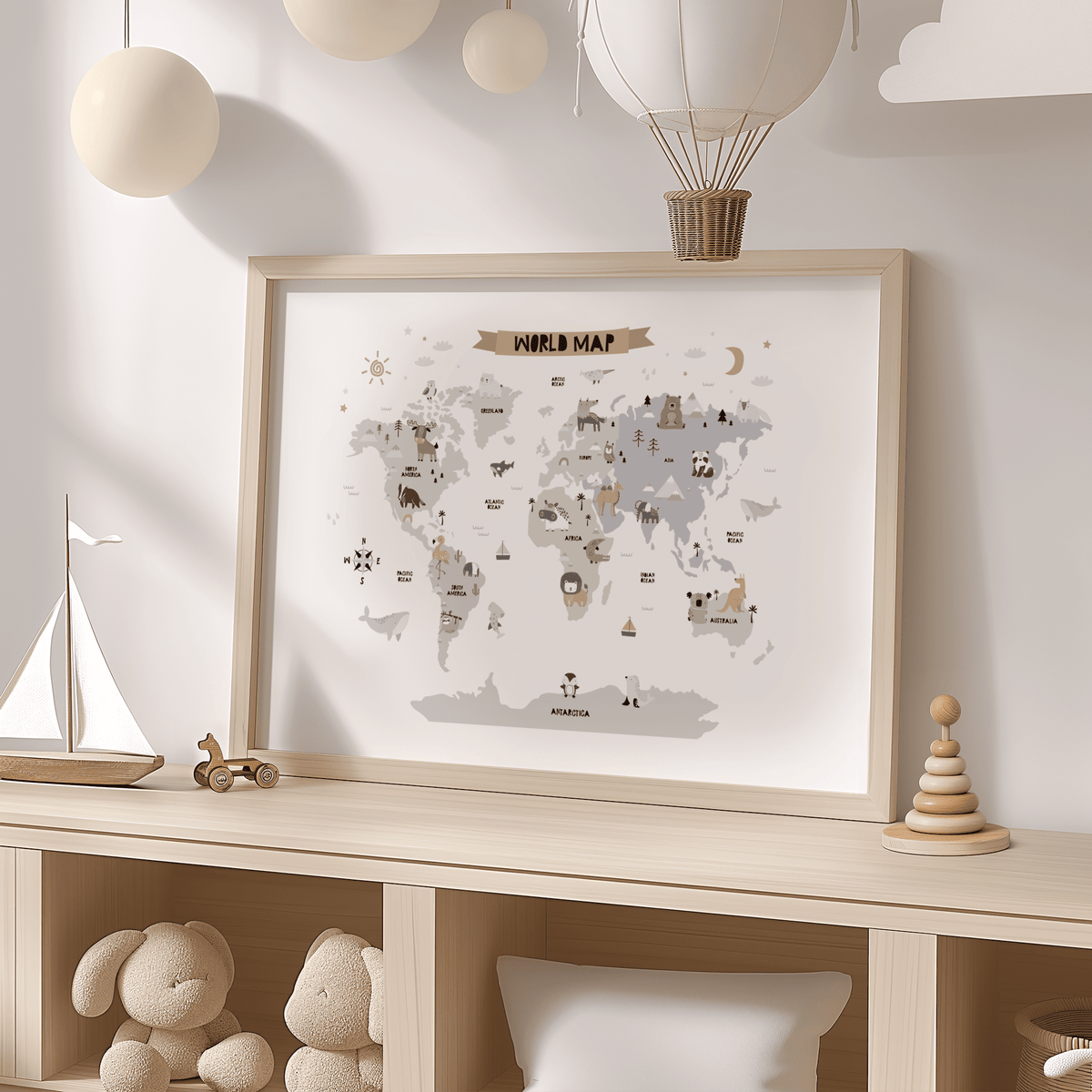 Childs World Map print in muted tones on a shelf with wooden toys and hanging paper lanterns