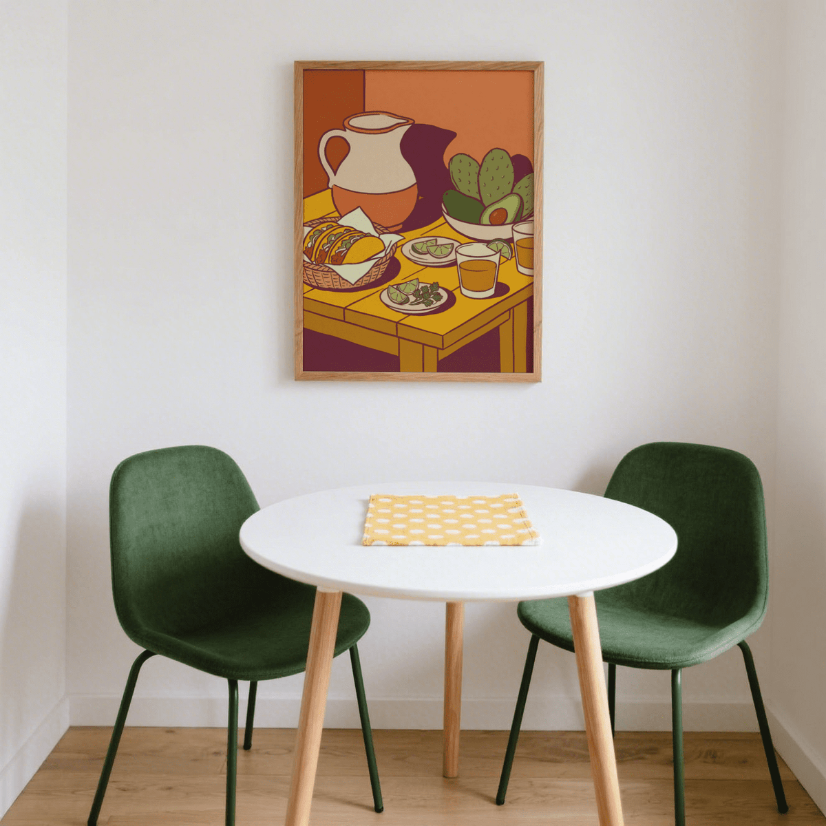 Taco Art Print hanging on a white wall above a small white round table with green chairs