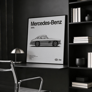 Classic Gullwing Sports Car poster in black and white leaning on a shelf beside books and a lamp