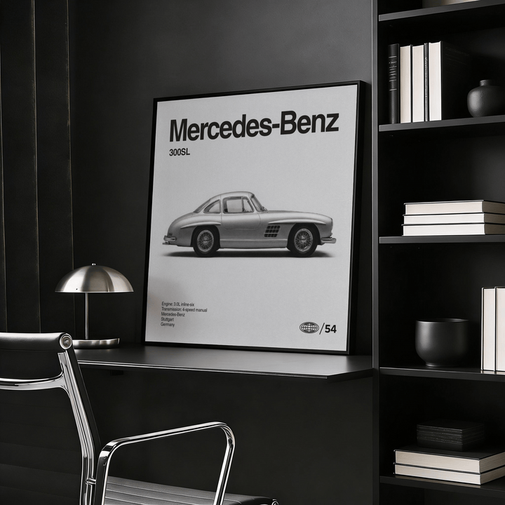 Classic Gullwing Sports Car poster in black and white leaning on a shelf beside books and a lamp