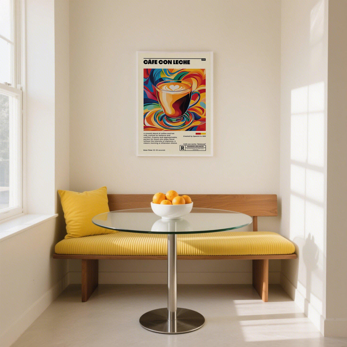 Print on a wall in a dining room featuring a colourful pop-art cup of cafe con leche above a yellow cushioned bench