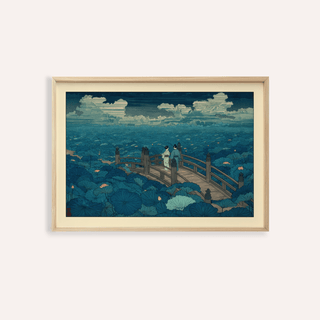 Framed print close-up of Hasui Kawase Japanese Woodblock with a couple on a wooden bridge surrounded by blue lotus