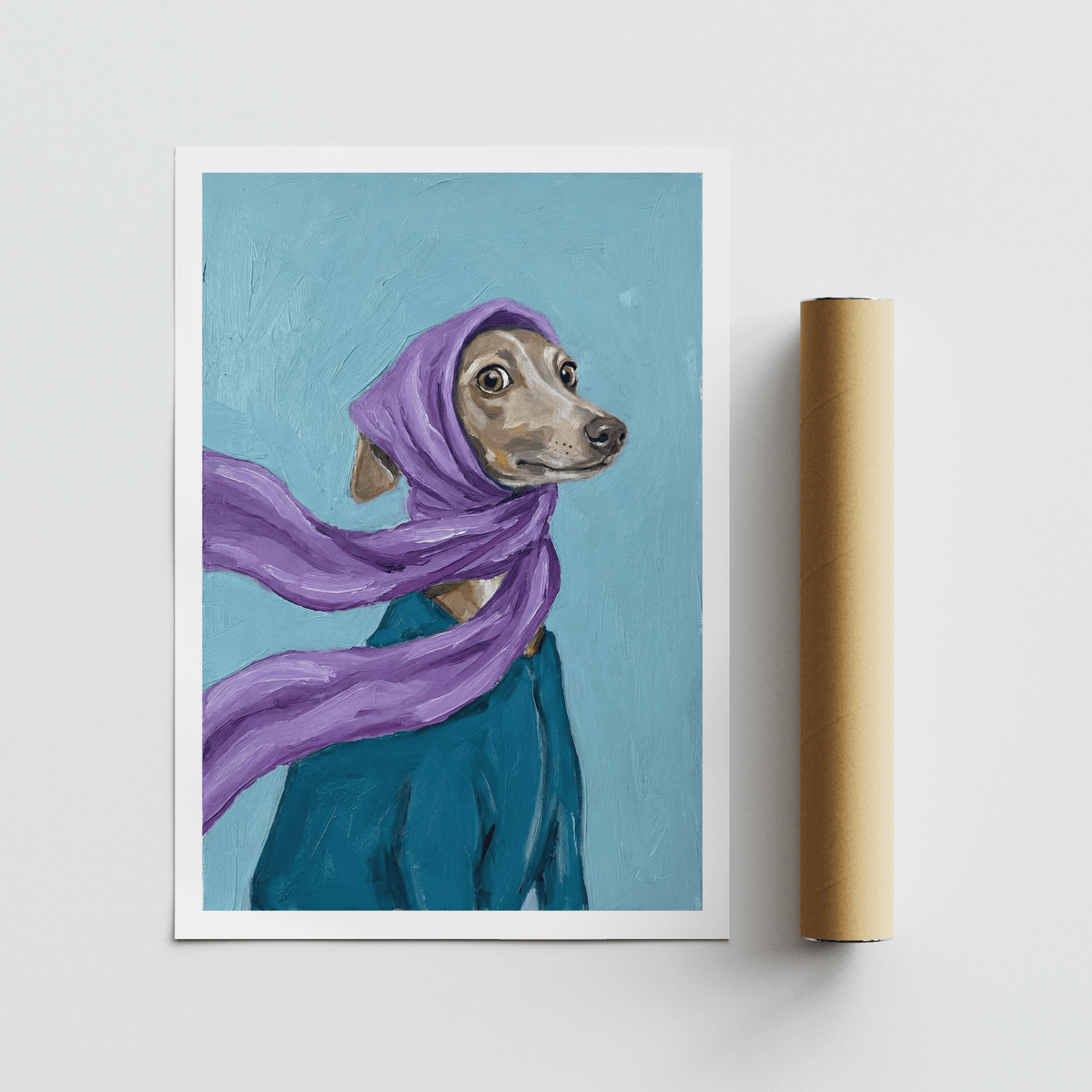 Dressed Up Dog Art print of a dog in a purple scarf with a blue background beside a packaging tube