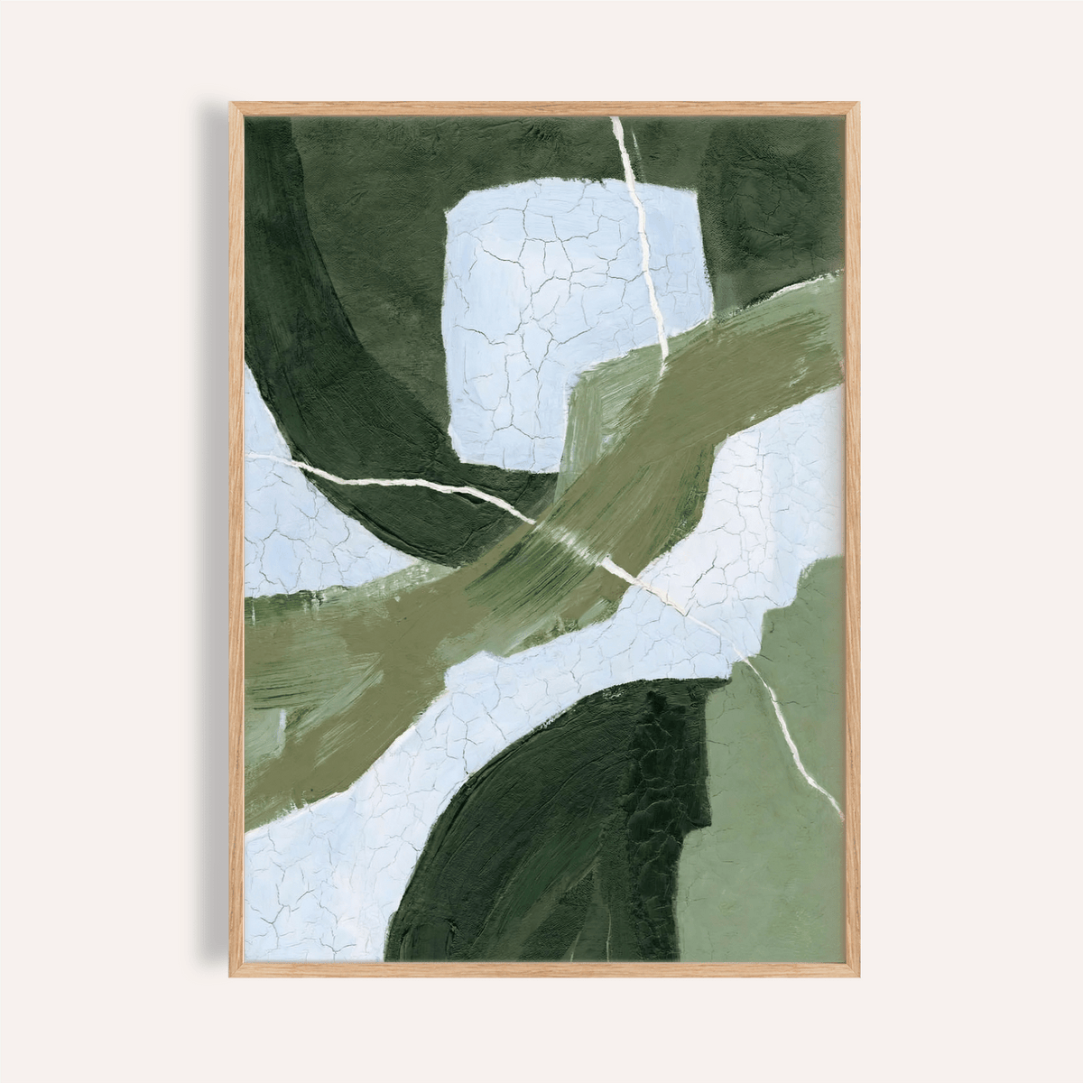 Abstract green wall art with dark and light green shapes and white cracks