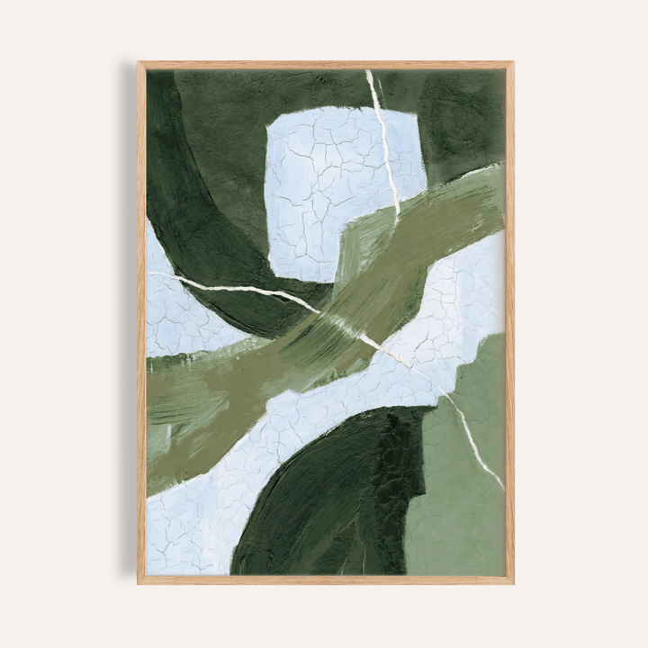Abstract green wall art with dark and light green shapes and white cracks