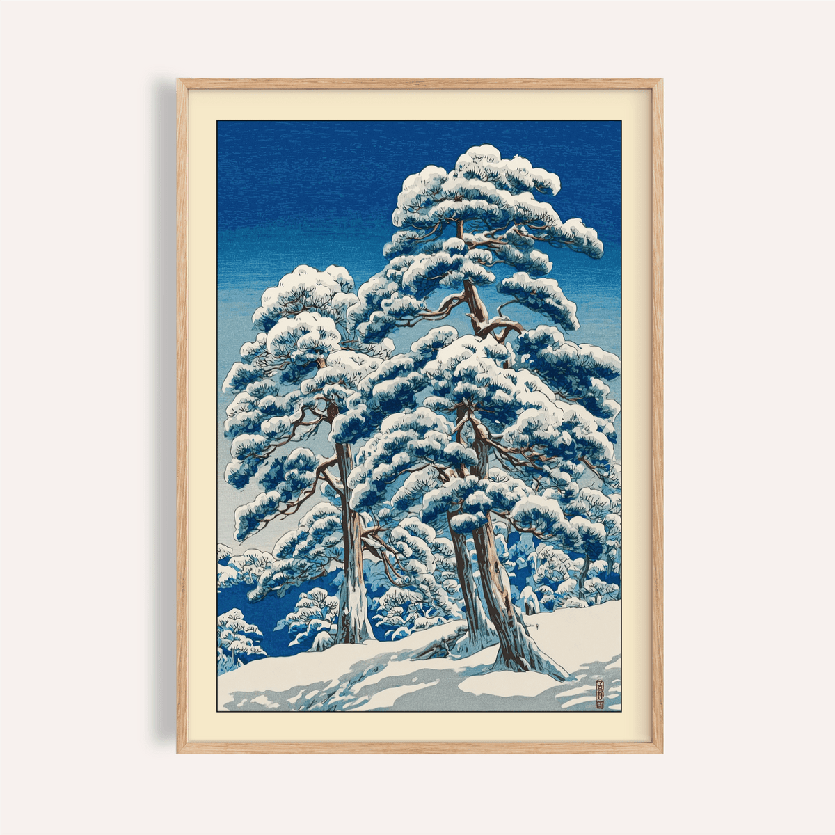 Framed close-up of Hasui Kawase Winter Landscape Print with snow-covered pine trees in Japanese woodblock style