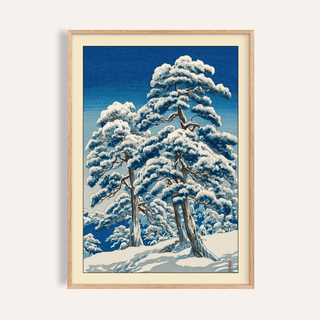 Framed close-up of Hasui Kawase Winter Landscape Print with snow-covered pine trees in Japanese woodblock style