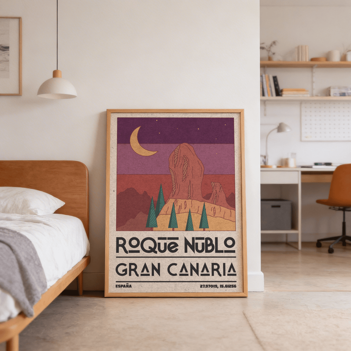 Roque Nublo wall art leaning against a wall in a bedroom with a brown bed frame and bedside lamp