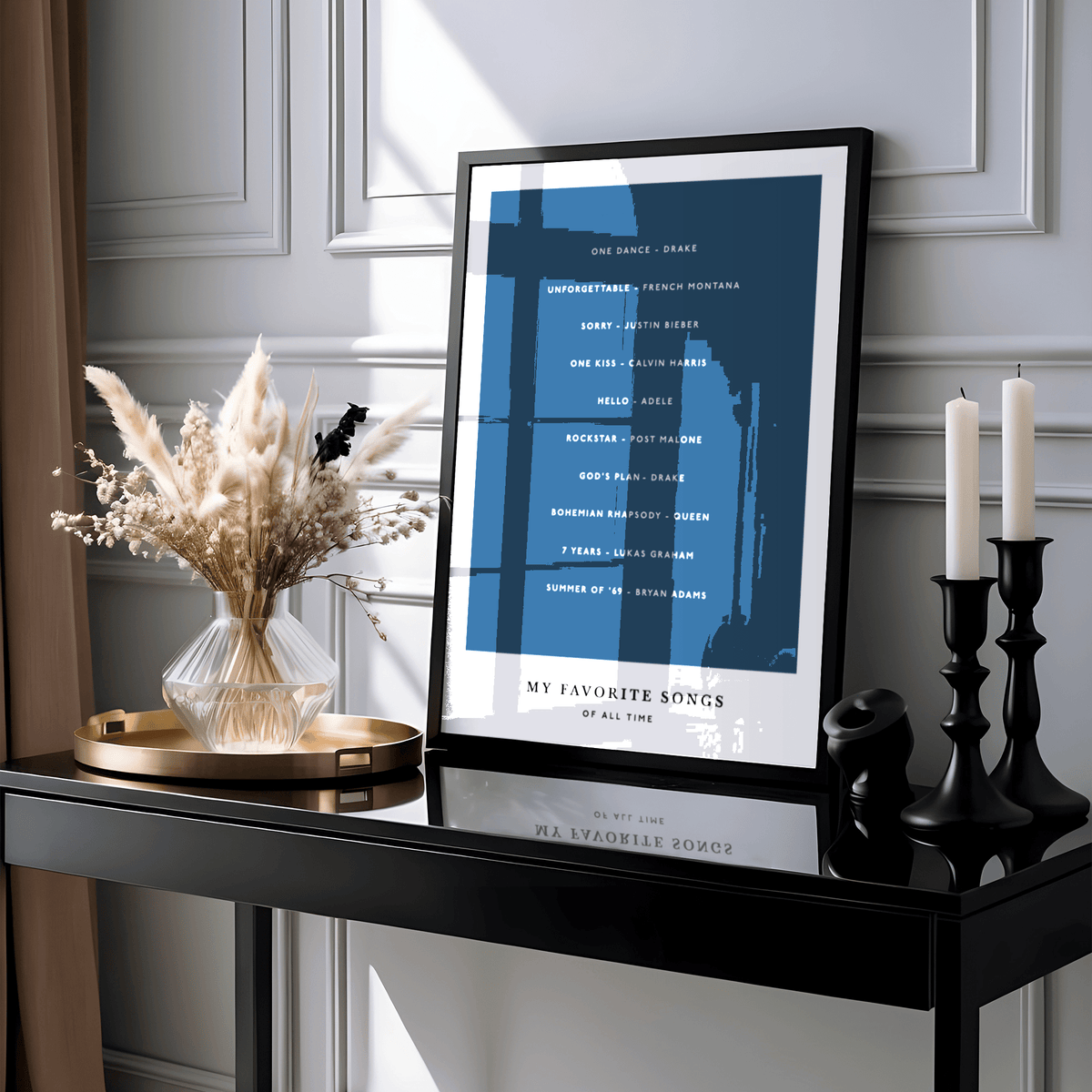 Custom Song wall art leaning on a black shelf with abstract blue background and white text