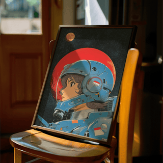 Framed Space Girl art close-up showing a female astronaut with a blue helmet and a red planet background with warm natural light