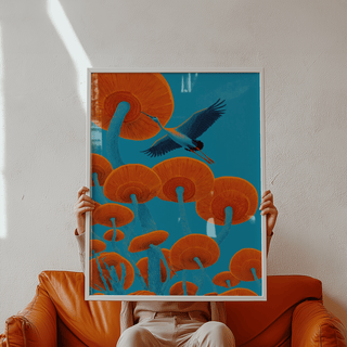 Framed Japandi Bird Print held above a burnt orange leather sofa with wall light reflections