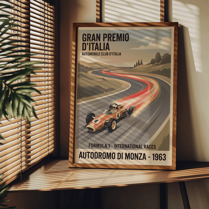 Framed retro racing art print of a vintage car on a winding road with a plant nearby