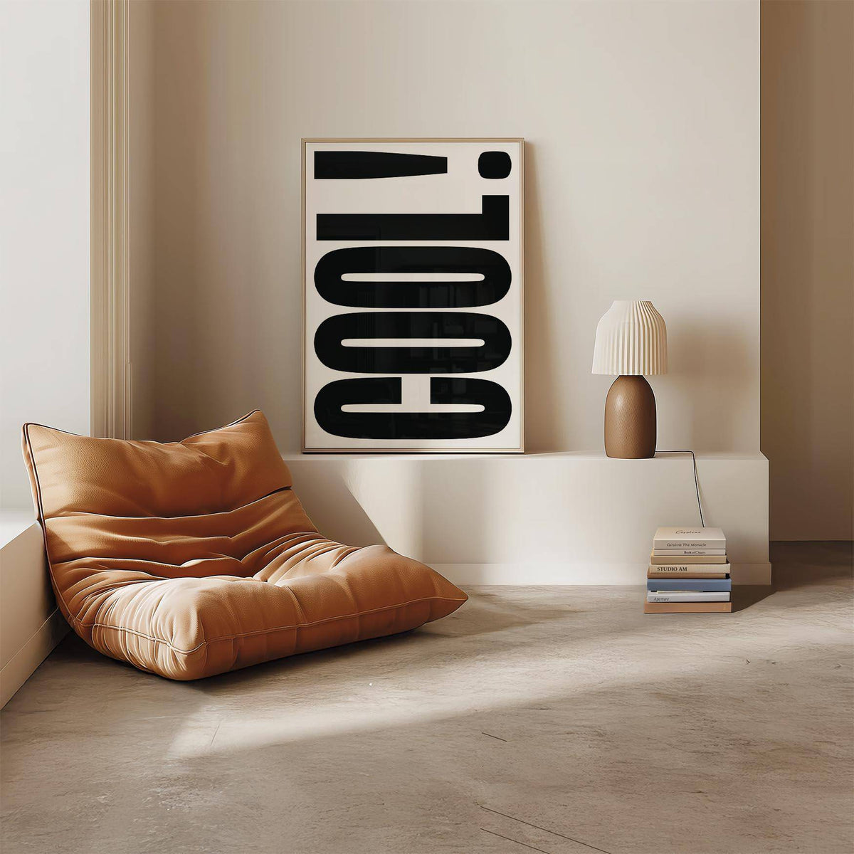 Print leaning with Cool Typography Poster text in black on white next to a brown leather chair and lamp