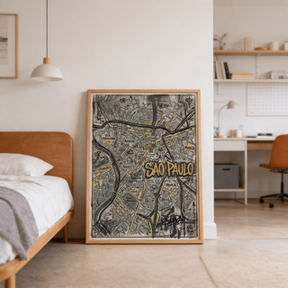 Print leaning on the floor of a bedroom showing Sao Paulo map art in street-art style with graffiti colours