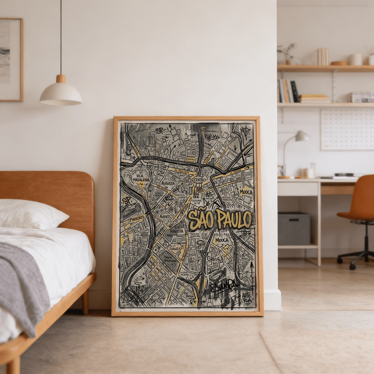 Print leaning on the floor of a bedroom showing Sao Paulo map art in street-art style with graffiti colours