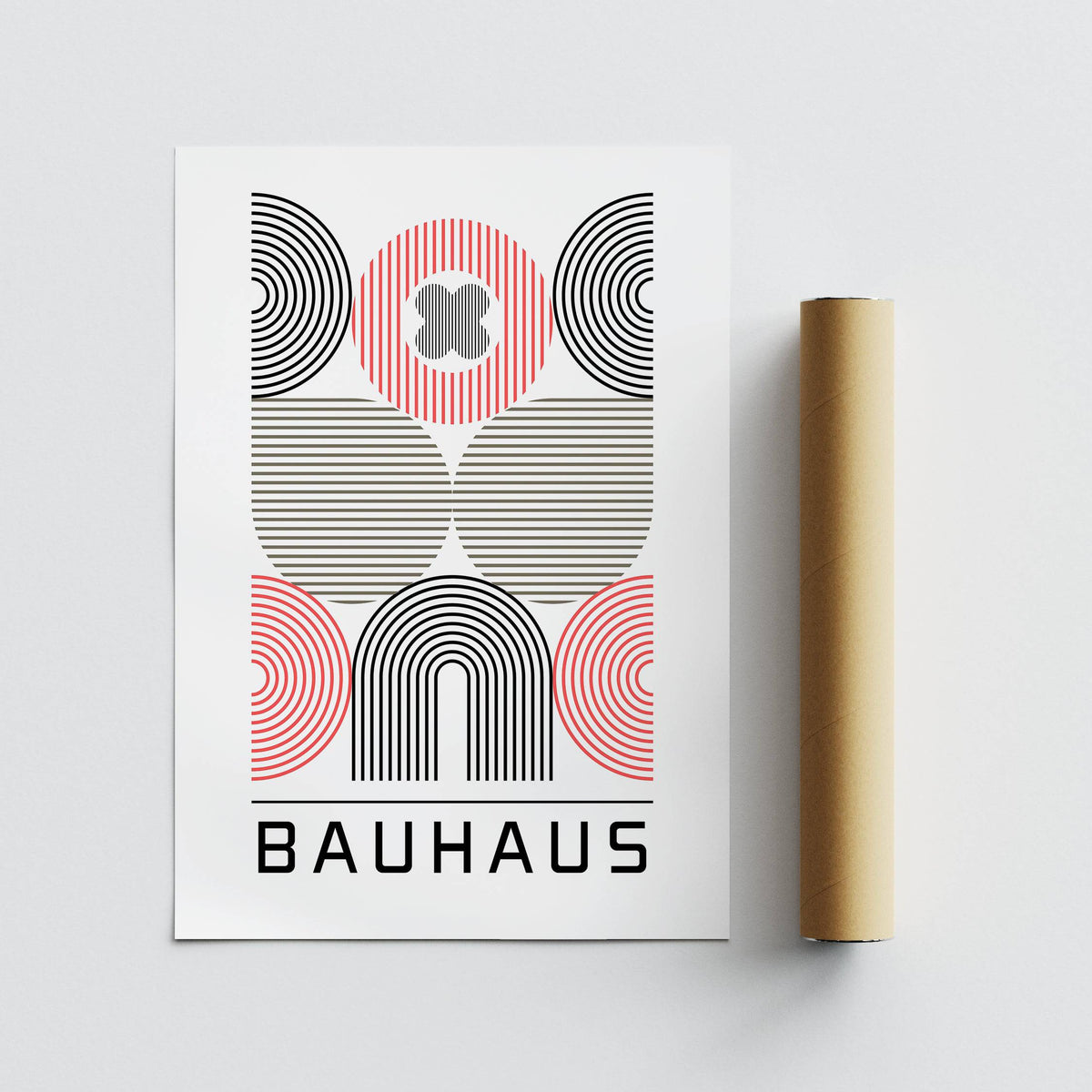 Flat artwork of abstract geometric shapes with black, red and grey lines next to a brown packaging tube
