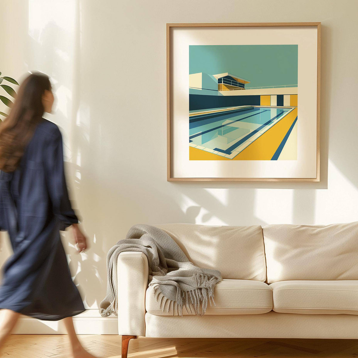 Minimalistic Art framed print of a swimming pool with yellow and teal tones above a beige sofa