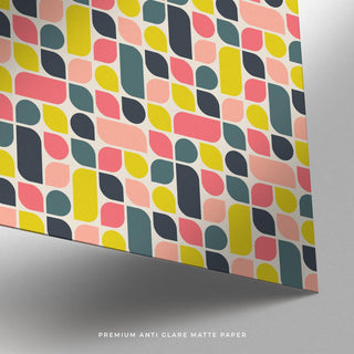 Close-up of colorful wall poster with abstract bauhaus geometric and pastel shapes on matte paper