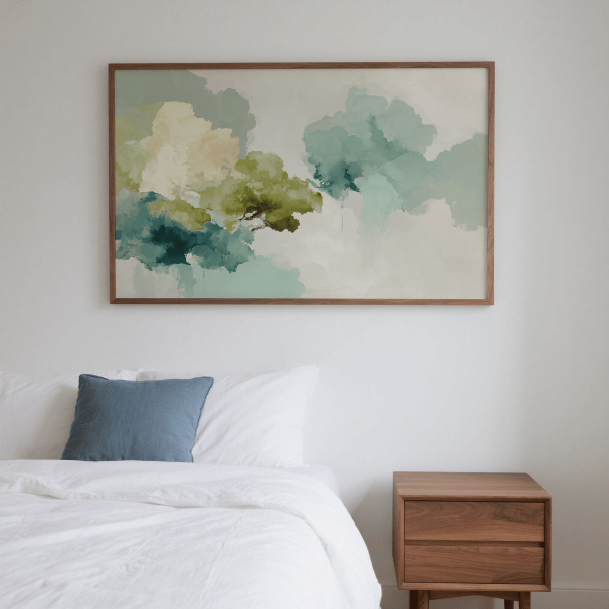 Abstract Tree Art Print in watercolour style with blue green and cream tones above a wooden bedside table in a bedroom