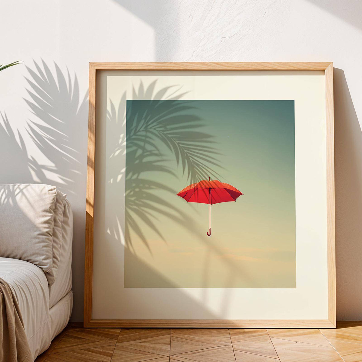 Framed Surreal Wall Art of a floating red umbrella with plant shadows on the wall