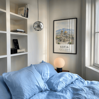 Sofia City art print of Alexander Nevsky Cathedral in watercolour hanging above a side table with globe lamp