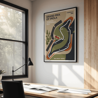 Imola Circuit Map Poster hanging above a wooden desk with black lamp and window lighting