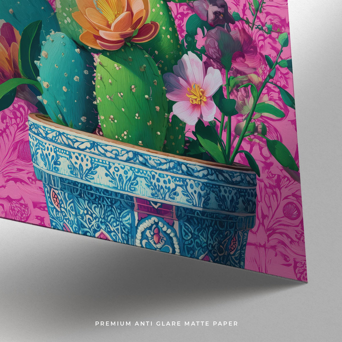 Detail close-up of a Heart Shaped Cactus wall art showing cactus plant in a blue patterned pot with pink floral background