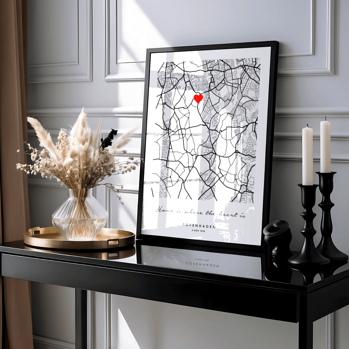 Custom Anniversary Gift print leaning on a black surface with neutral floral decoration and candles