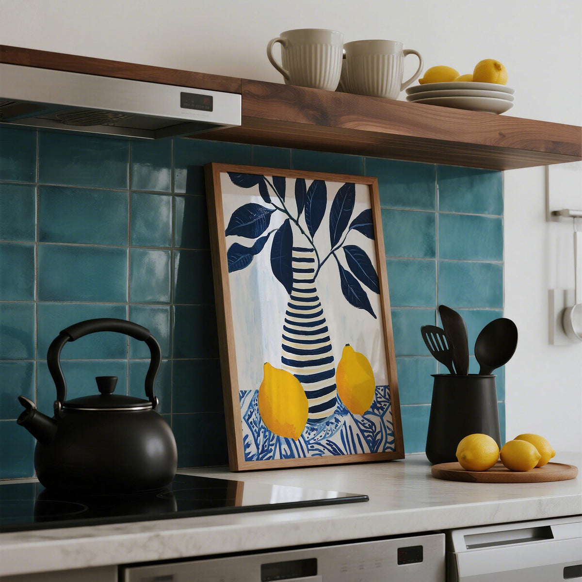 Print leaning on kitchen counter showing striped vase with lemons and dark blue leaves against teal tiles