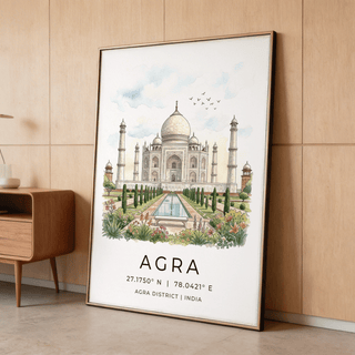 Print leaning on a floor wall art of Taj Mahal with watercolour style and floral garden beside a wooden shelf