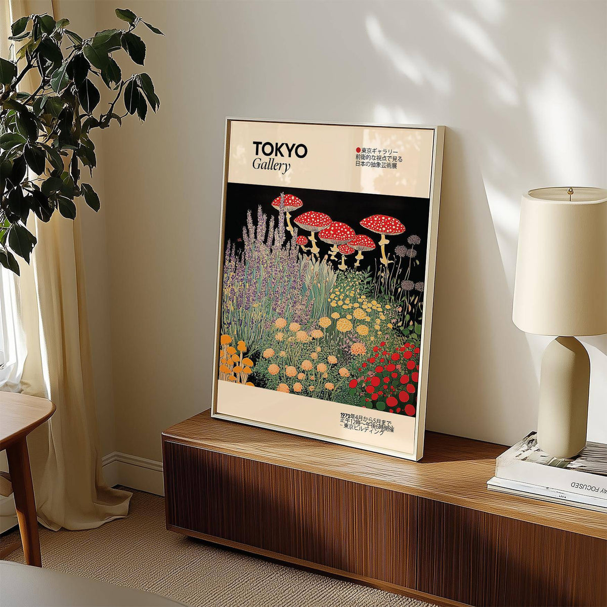 Floral Prints Vintage print with red spotted mushrooms and colourful flowers leaning on a wooden cabinet with a lamp
