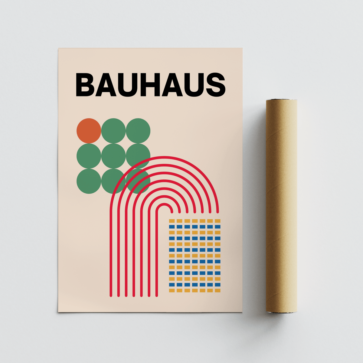 Abstract Shapes Print showing colourful geometric shapes with a rolled packaging tube on a pale surface