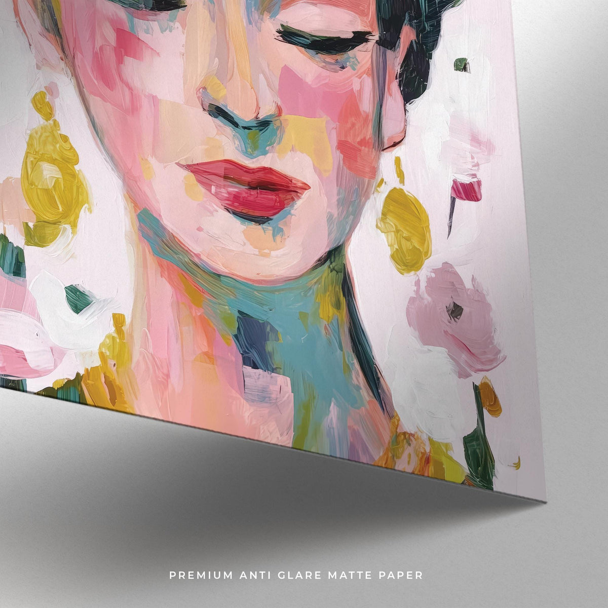 Close-up of paintings of Frida Kahlo showing abstract watercolour female face with pink and yellow flowers